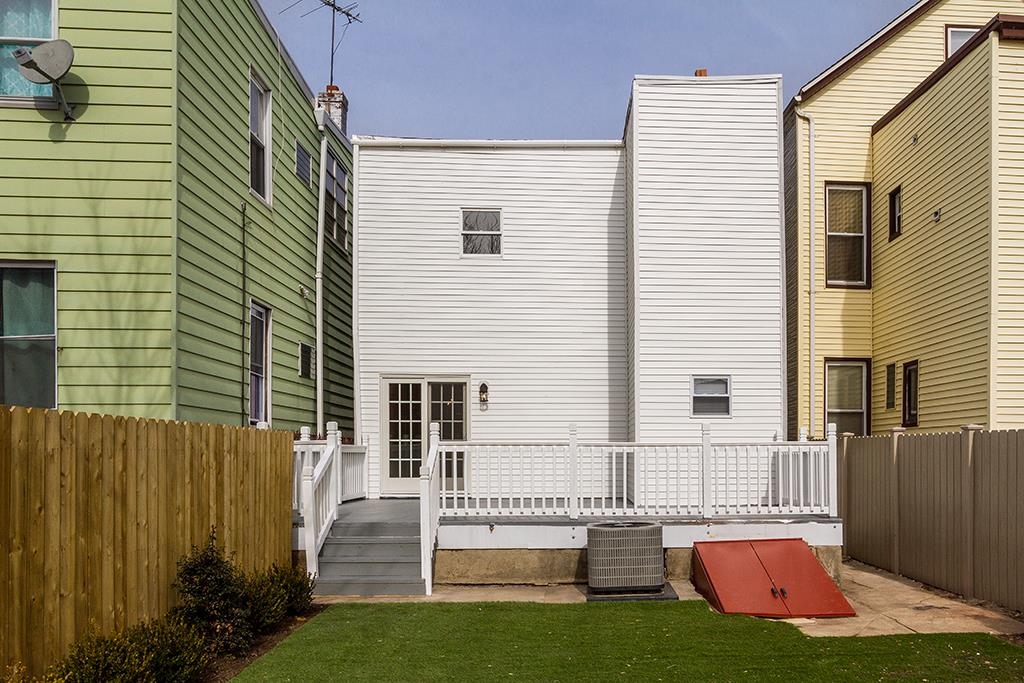 40 West 19th Street Bayonne, NJ 07002 - Photo 35 of 37 a backyard of a house with barbeque oven