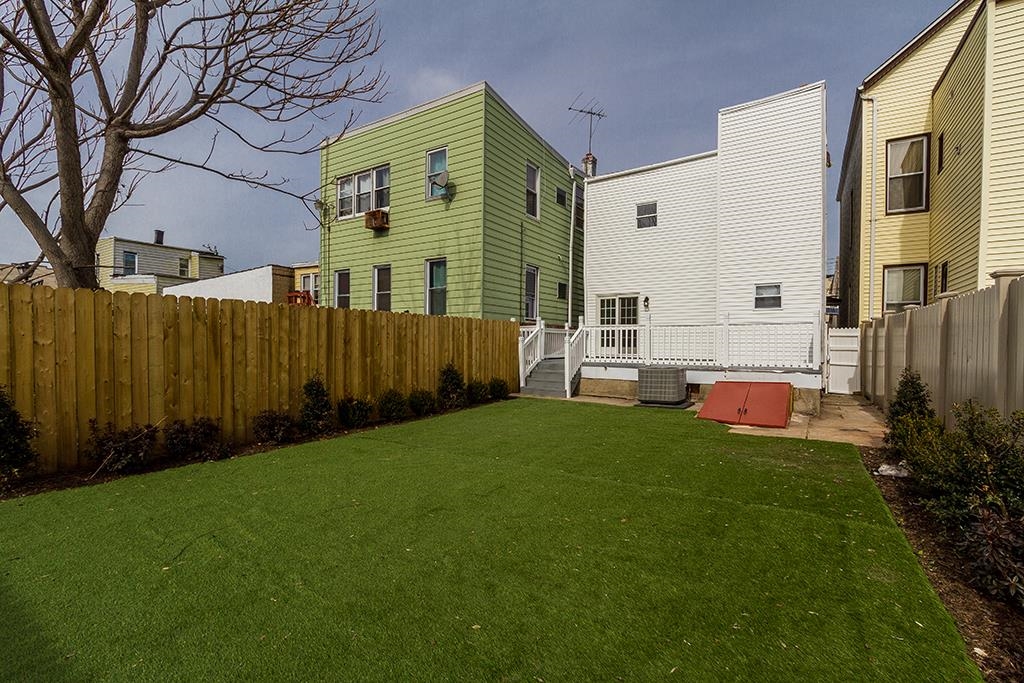 40 West 19th Street Bayonne, NJ 07002 - Photo 37 of 37 a view of backyard with a garden