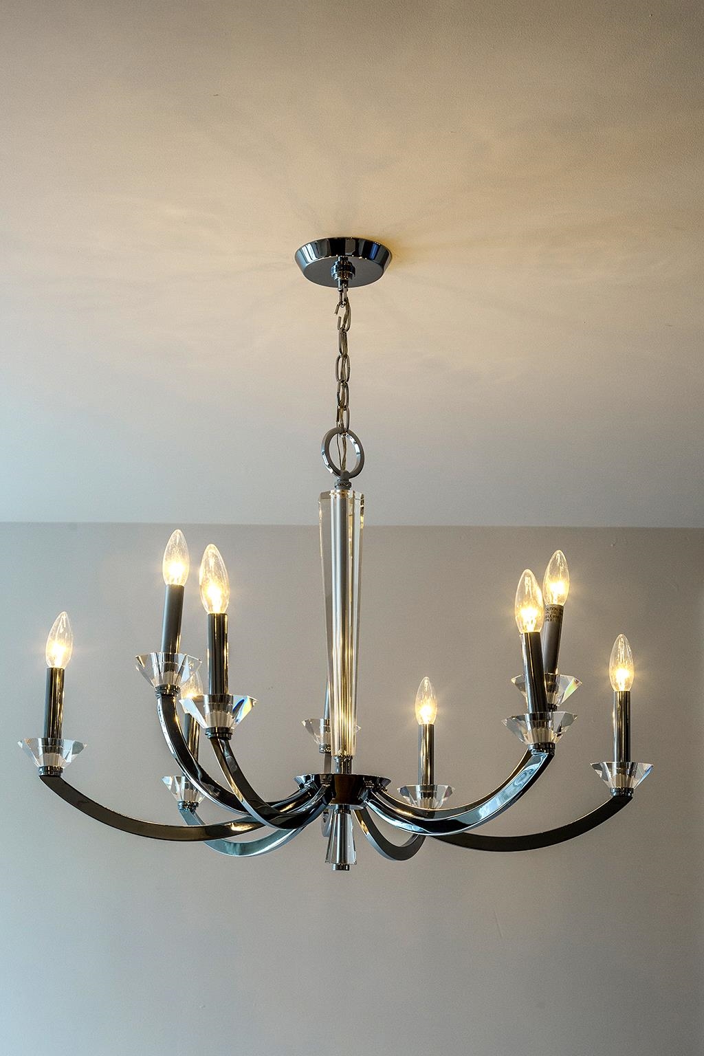 40 West 19th Street Bayonne, NJ 07002 - Photo 5 of 37 a room with lamp and a chandelier