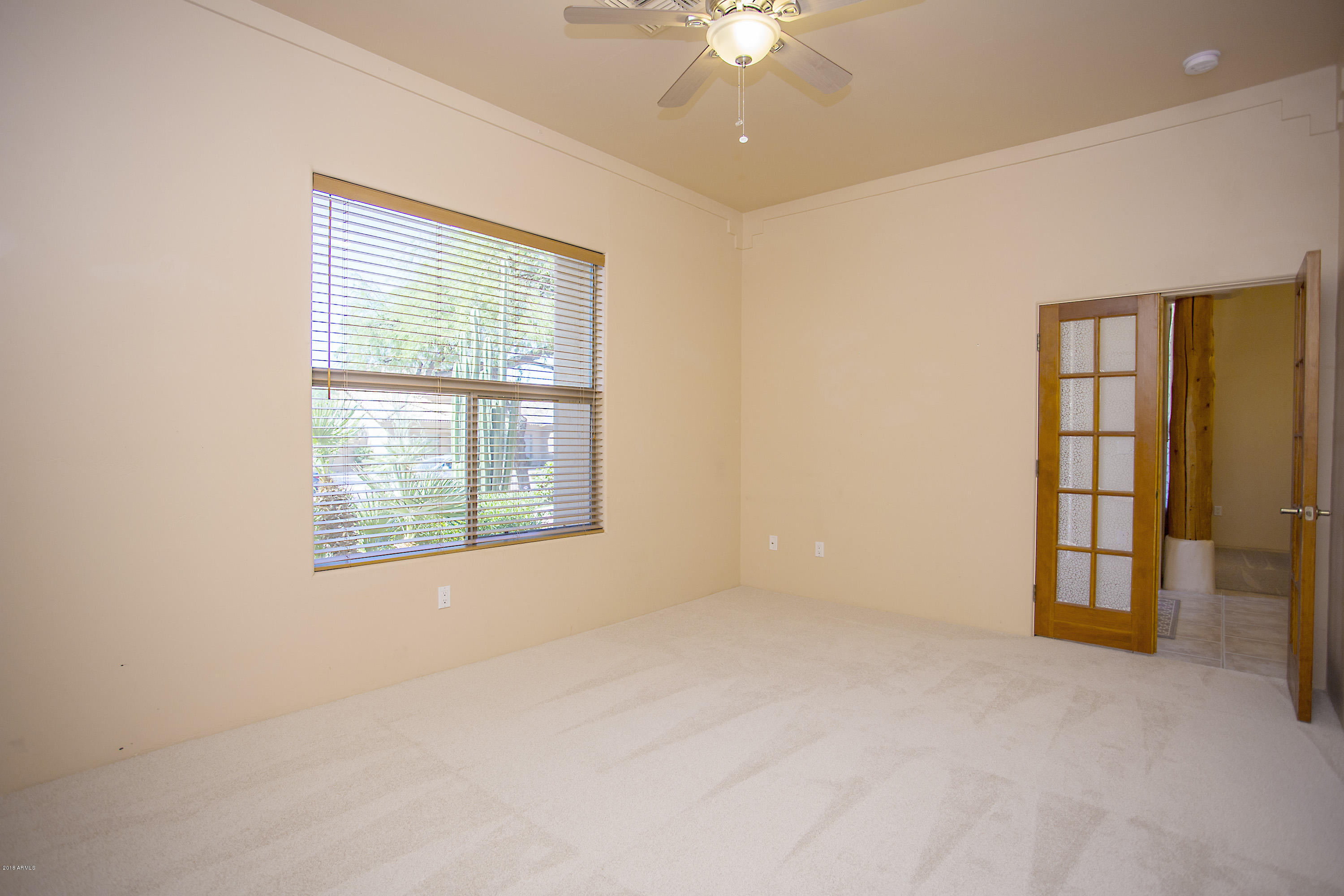4055 North Recker Road, Unit 76 Mesa, AZ 85215 - Photo 29 of 43 Bed 2 french doors