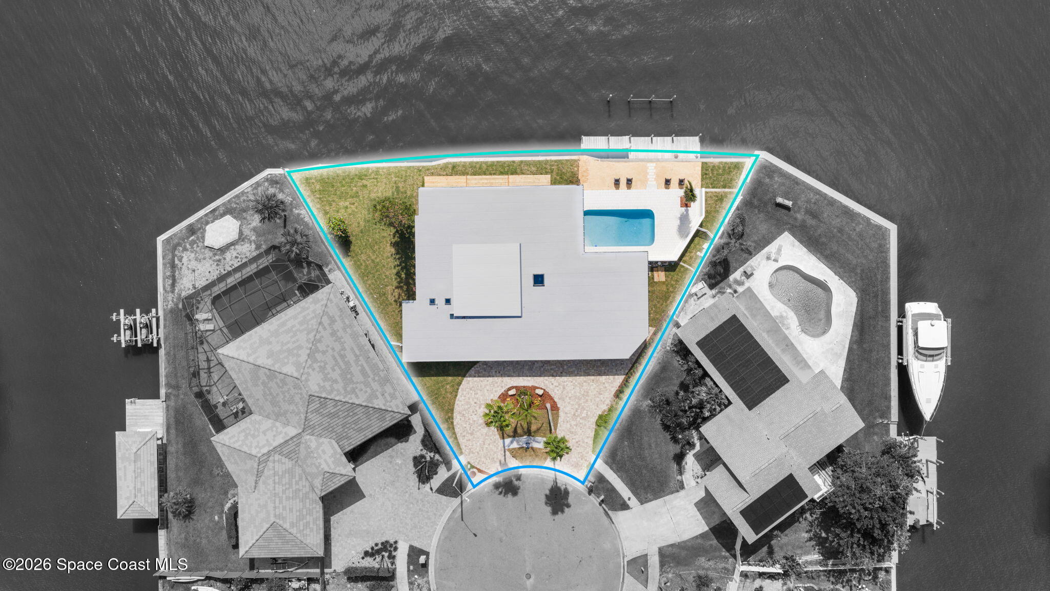 1775 East Riviera Drive Merritt Island, FL 32952 - Photo 7 of 135 an aerial view of a house with a swimming pool