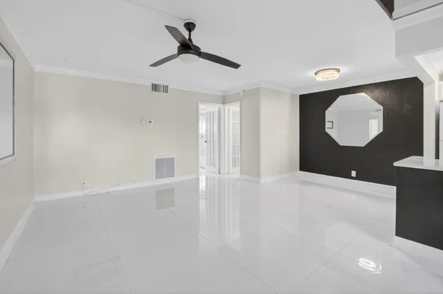 a view of a living room and a window