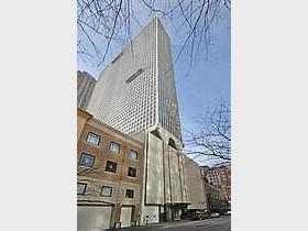 111 East Chestnut Street, Unit 31J Chicago, IL 60611 - Photo 1 of 9 a view of a brick building with large windows