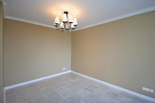 111 East Chestnut Street, Unit 31J Chicago, IL 60611 - Photo 5 of 9 a view of a chandelier in a room