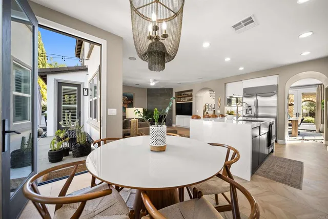 a large bathroom with a double vanity sink a large mirror and shower