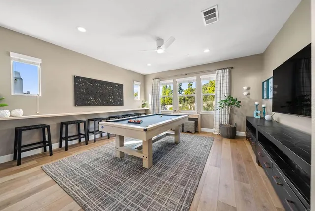 a view of a chairs and table in a patio