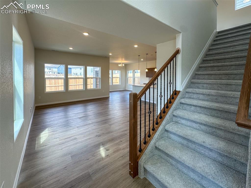 10820 Raylan Way Peyton, CO 80831 - Photo 3 of 35 a view of an entryway with wooden floor