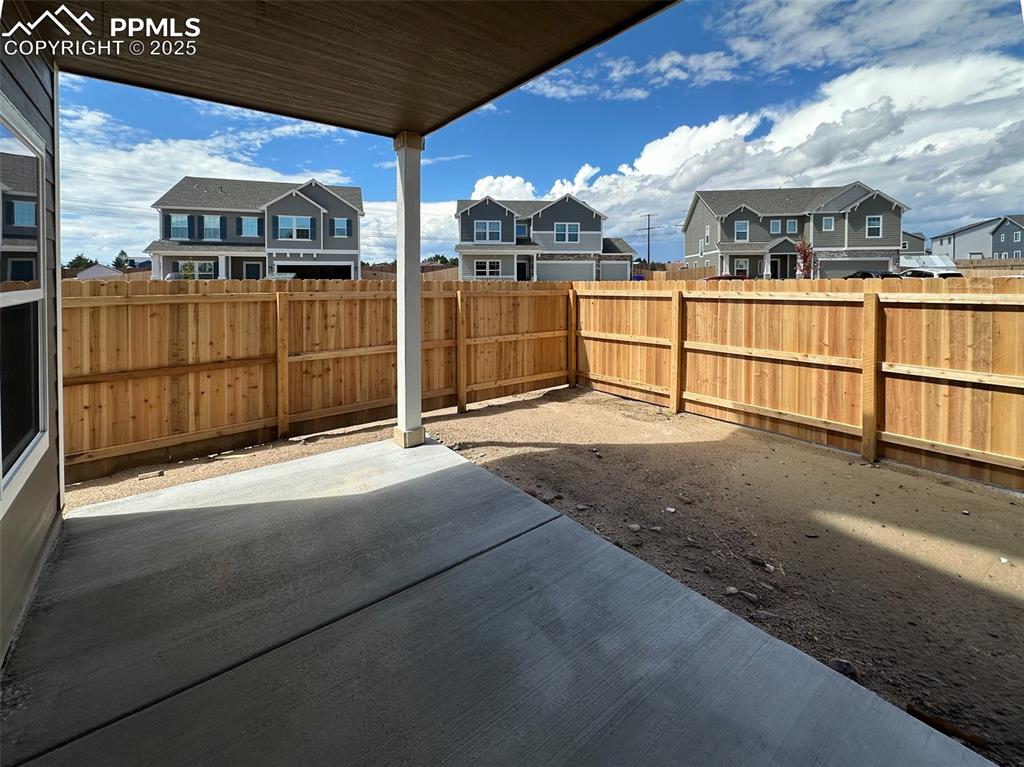 10820 Raylan Way Peyton, CO 80831 - Photo 7 of 35 a view of a house with a garage
