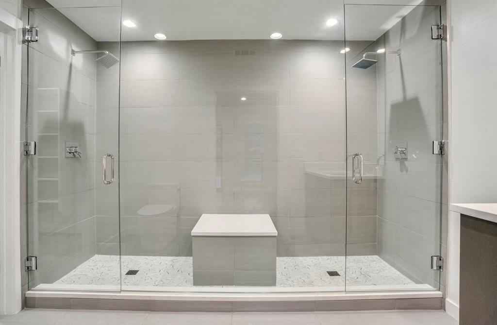 1408 South Alamo Road Rockwall, TX 75087 - Photo 27 of 40 a bathroom with a shower and a bathtub