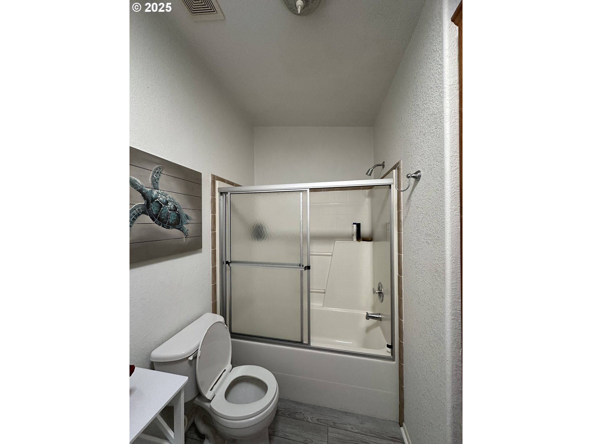 181 Vada Street Carson, WA 98610 - Photo 16 of 30 a bathroom with a toilet and a shower