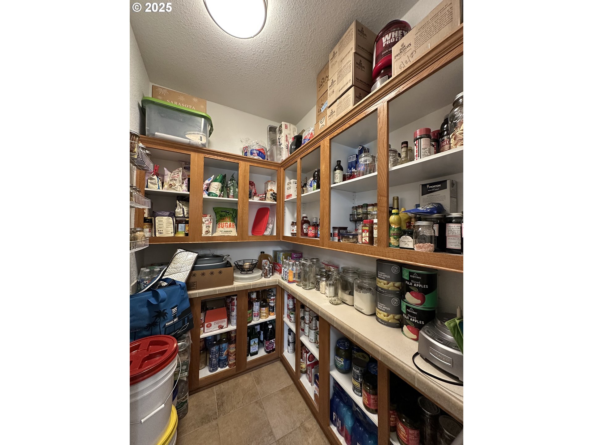 181 Vada Street Carson, WA 98610 - Photo 19 of 30 a view of a kitchen with fridge and rack