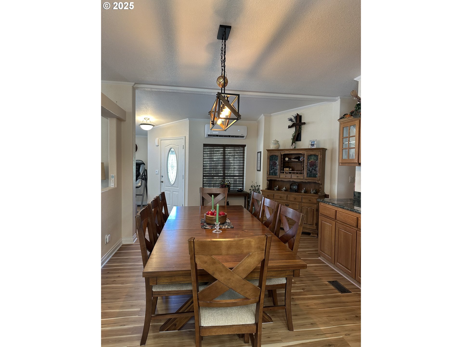 181 Vada Street Carson, WA 98610 - Photo 5 of 30 a view of a dining room with furniture and wooden floor