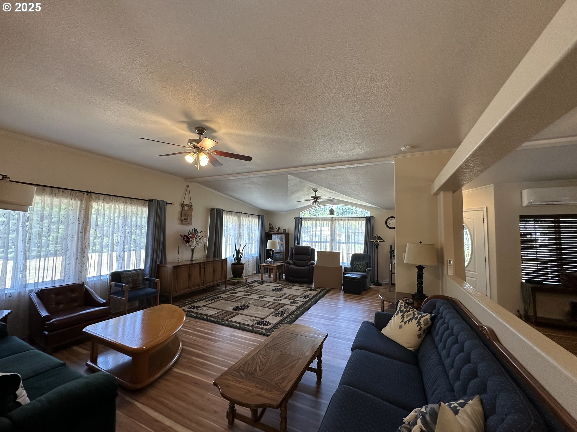 181 Vada Street Carson, WA 98610 - Photo 7 of 30 a living room with furniture and a large window