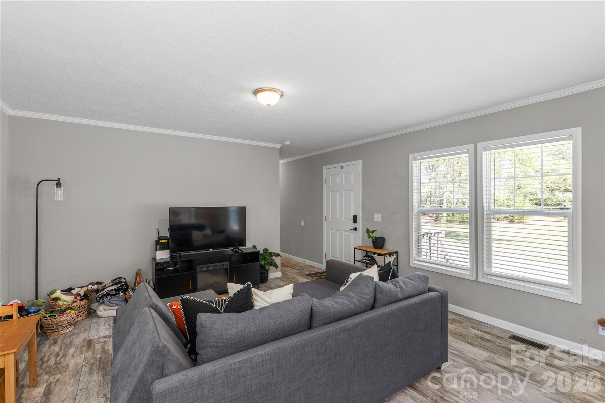 3041 Dr Nichols Road York, SC 29745 - Photo 15 of 26 a living room with furniture and a flat screen tv
