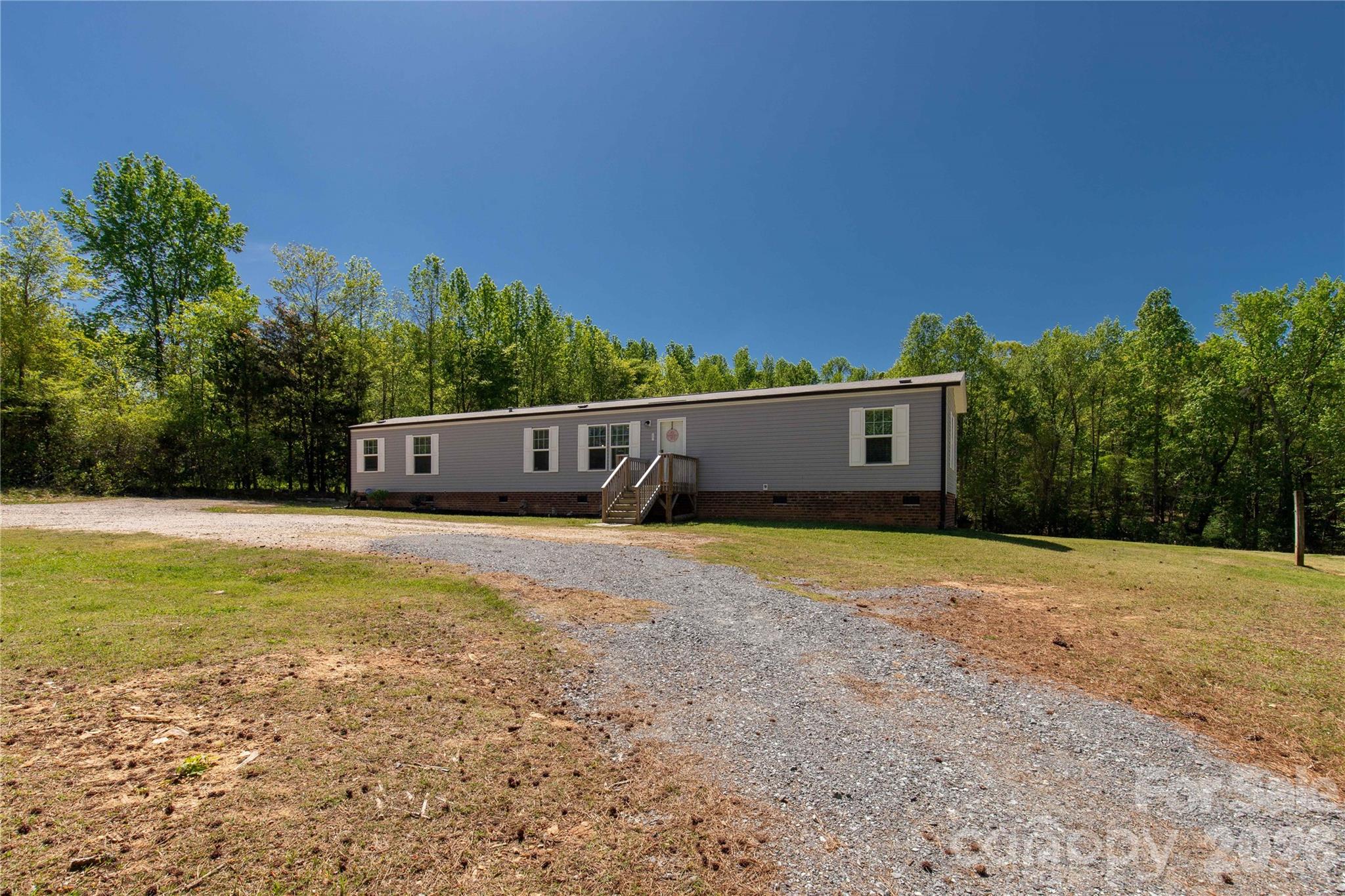 3041 Dr Nichols Road York, SC 29745 - Photo 5 of 26 a view of a house with a yard