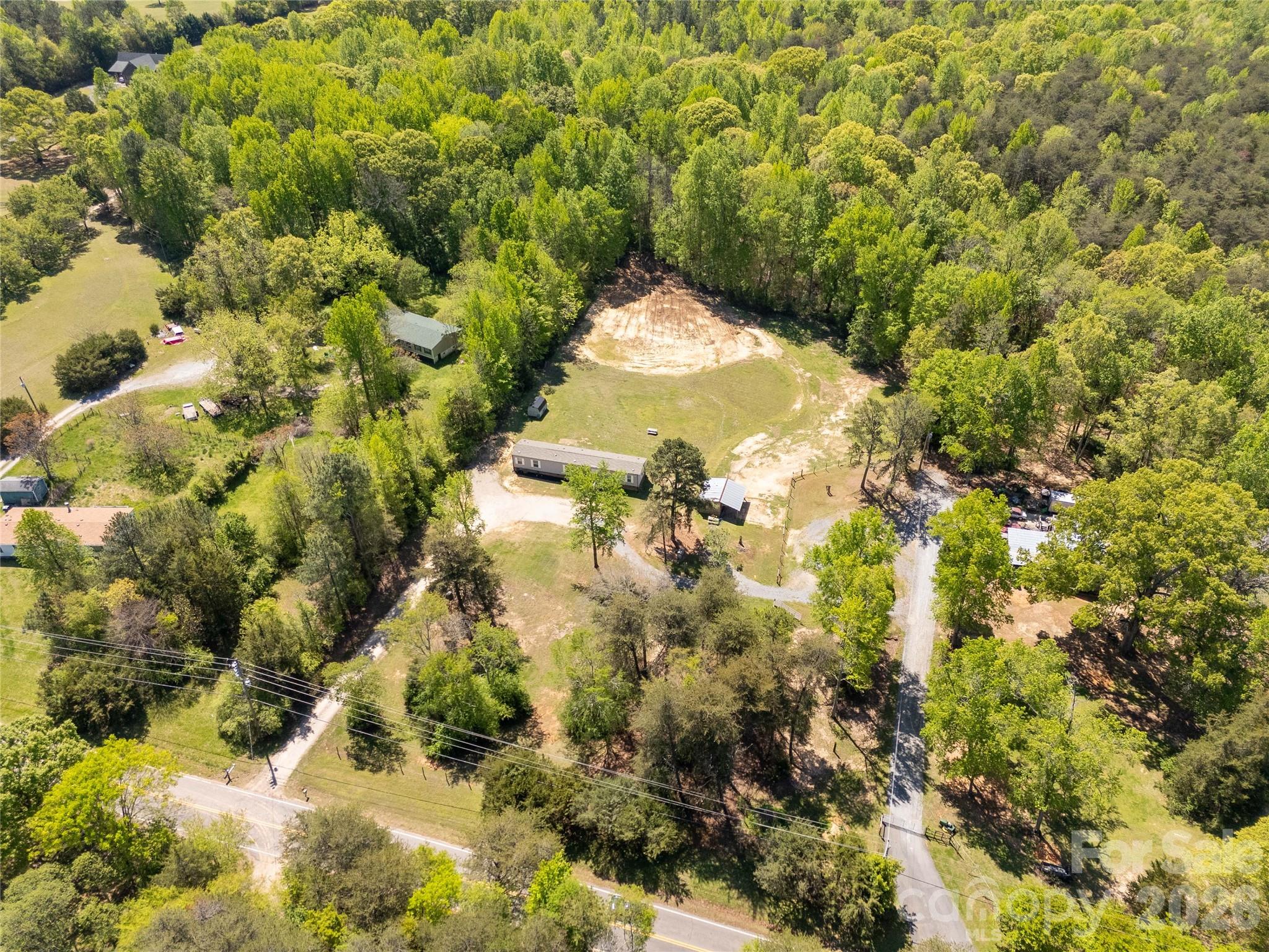 3041 Dr Nichols Road York, SC 29745 - Photo 7 of 26 a close up of a tree in a yard