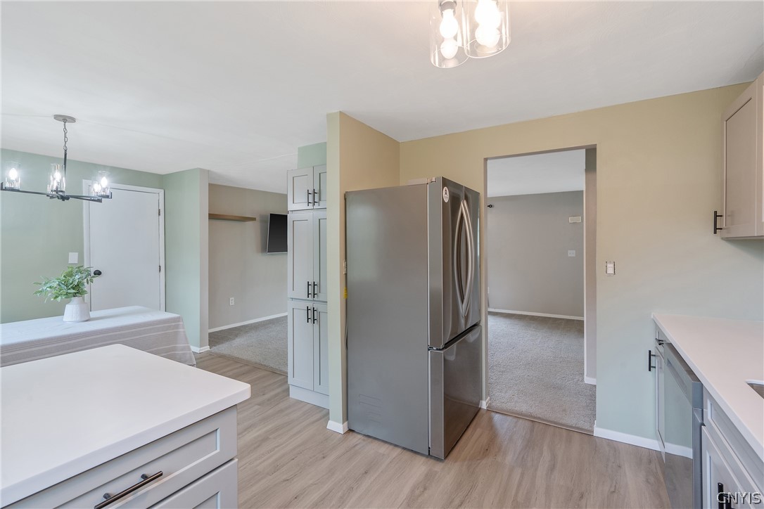 114 Saltwell Road Salina, NY 13090 - Photo 10 of 27 Ahead of us is a smart alcove to make space for the new refrigerator keeping all of your cooking needs right at your fingertips.