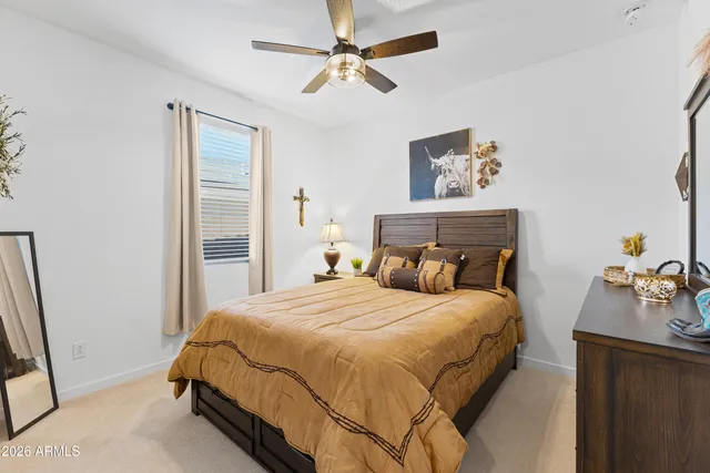 a bathroom with double vanity sink toilet and shower