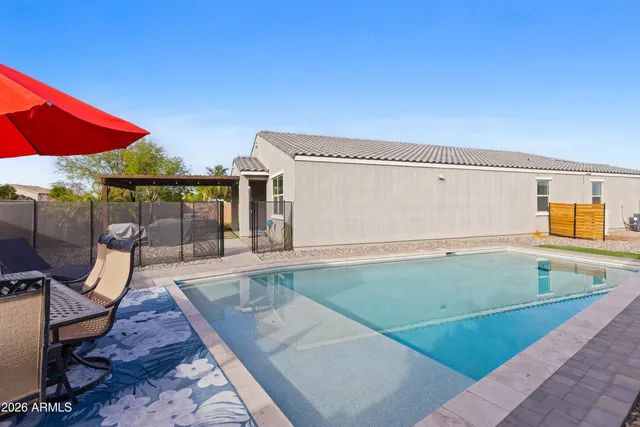 an aerial view of a house with a garden view