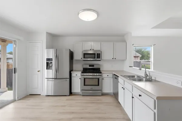 $216,000 | 164 Opal Lake Drive, Kyle, TX 78640