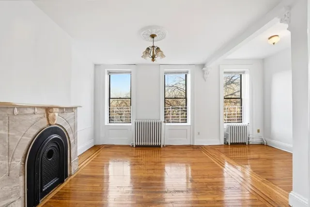 a view of livingroom with furniture washer and dryer