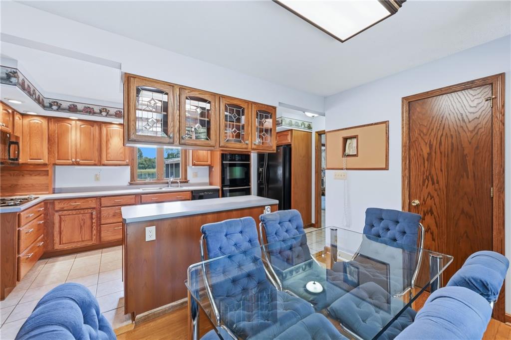 612 Methodist Road Greenville, PA 16125 - Photo 31 of 48 DOOR ON RIGHT BESIDE TABLE AND CHAIRS IS A LARGE PANTRY