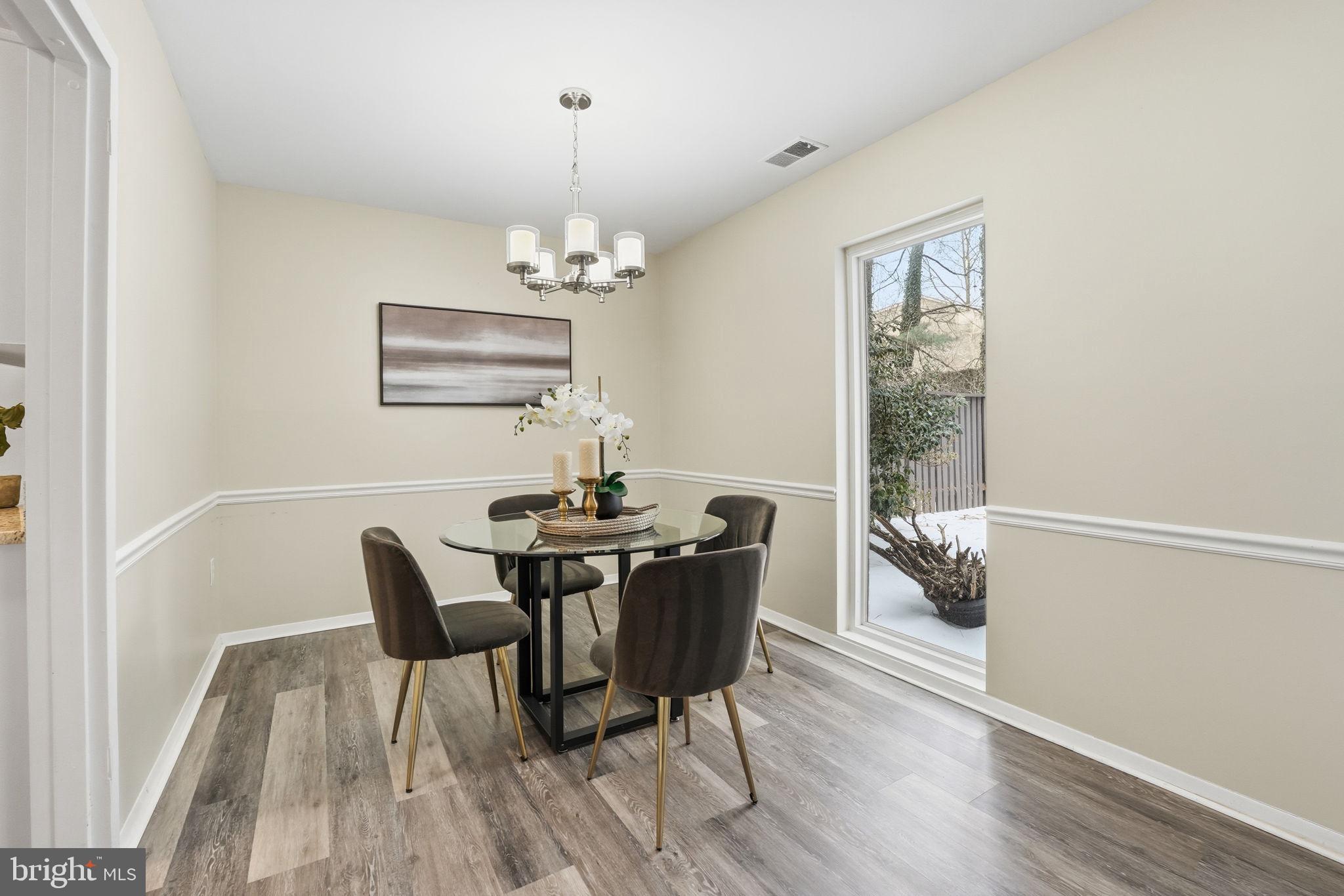 1735 Ivy Oak Square, Unit 7 Reston, VA 20190 - Photo 8 of 37 Dining room off kitchen
