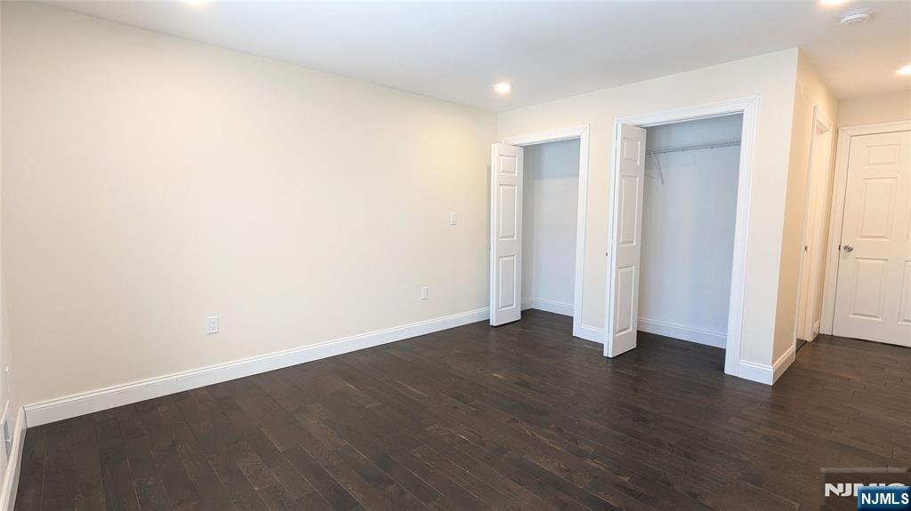 7 Maple Street, Unit 1 Bloomfield, NJ 07003 - Photo 14 of 19 a view of an empty room with wooden floor