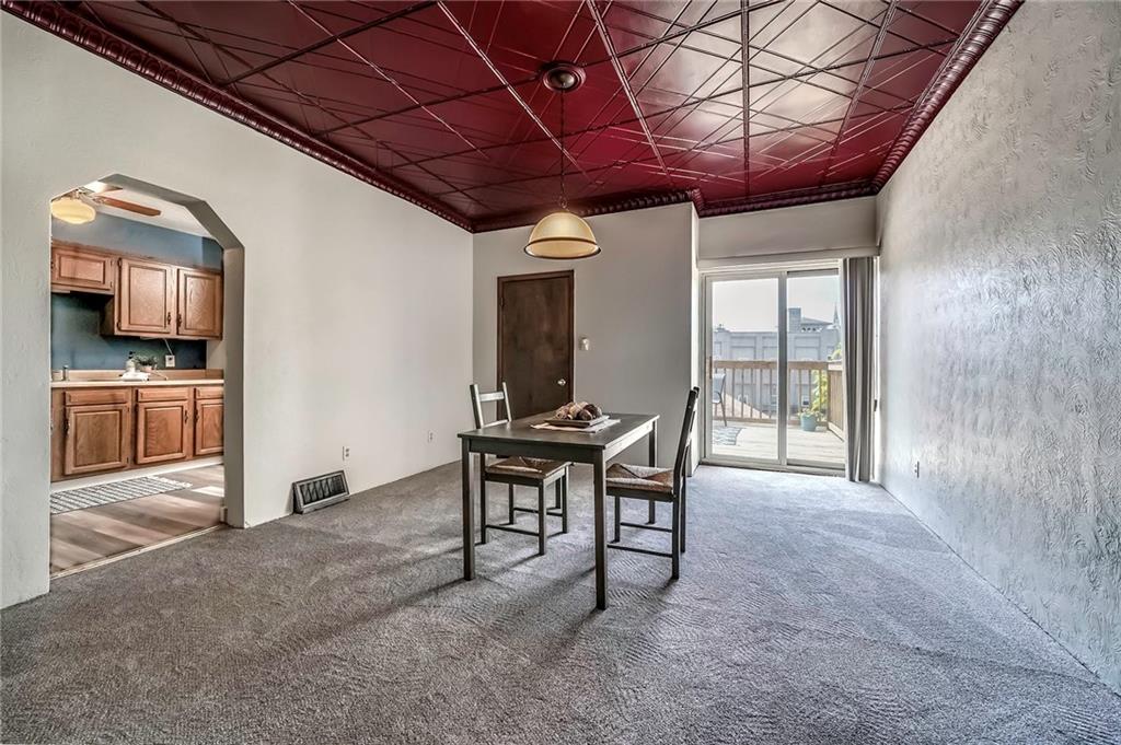 805 Frank Street McKees Rocks, PA 15136 - Photo 11 of 25 a dining room with furniture and wooden floor