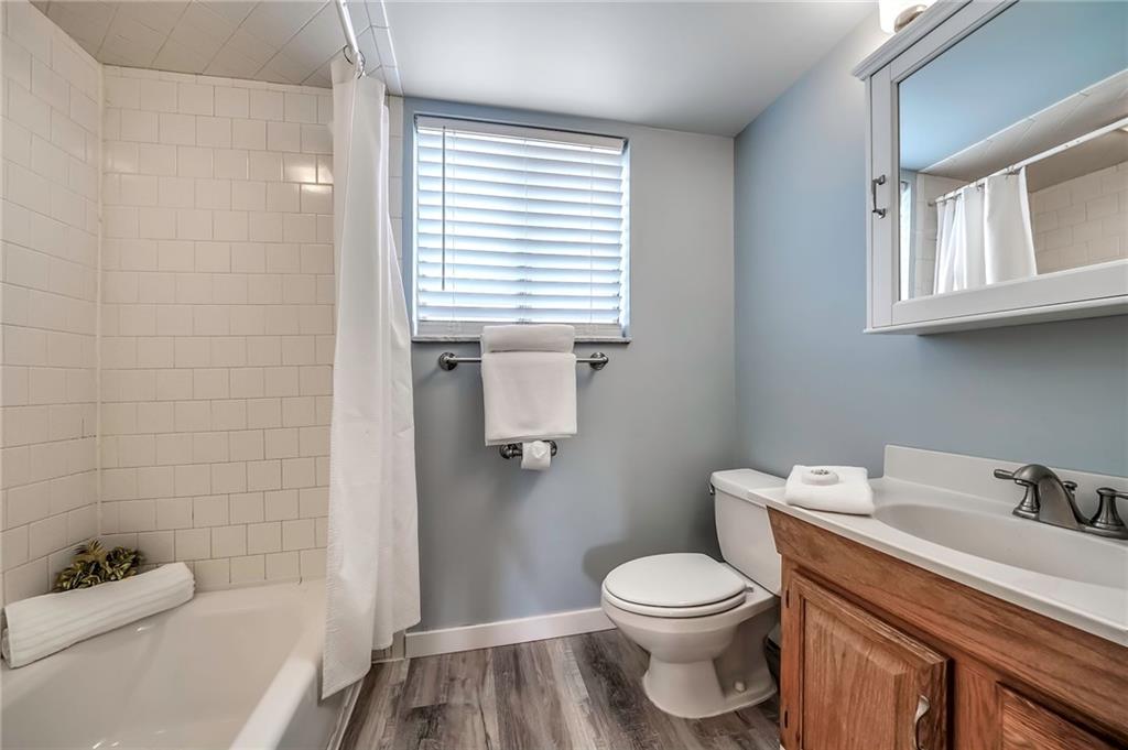 805 Frank Street McKees Rocks, PA 15136 - Photo 20 of 25 a bathroom with a sink a toilet and shower