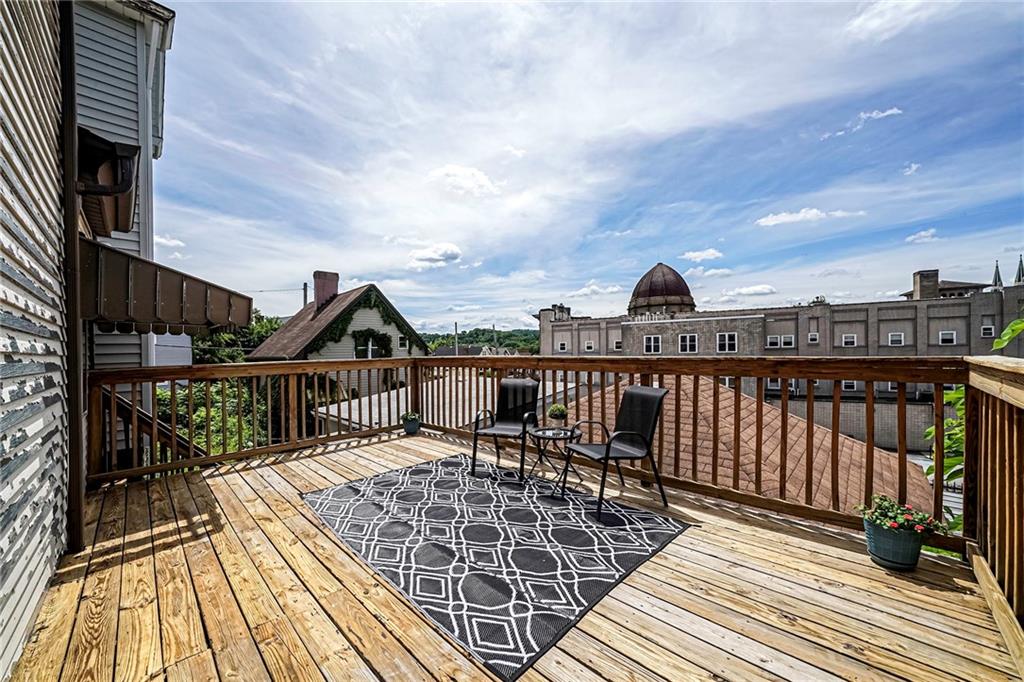 805 Frank Street McKees Rocks, PA 15136 - Photo 22 of 25 a view of balcony with wooden floor