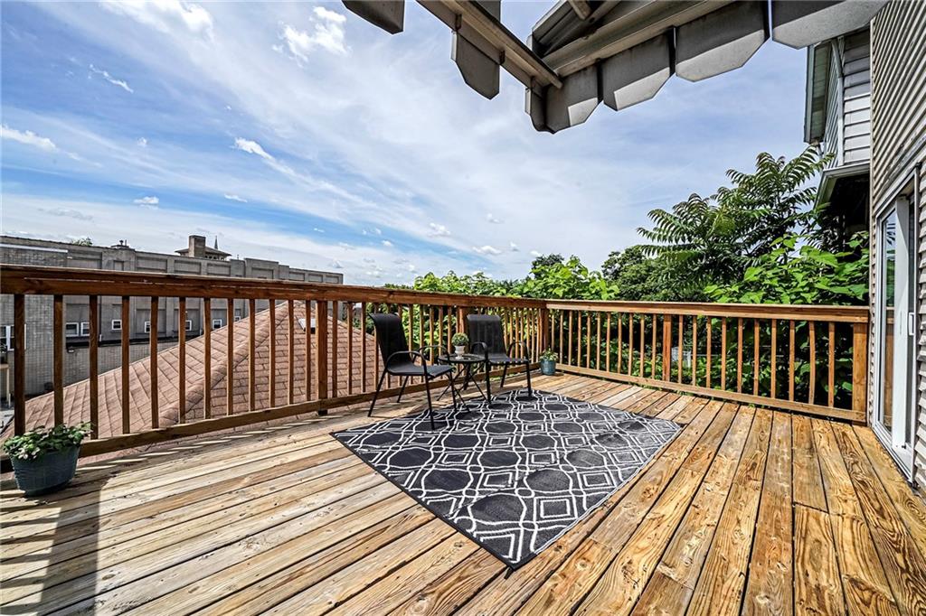 805 Frank Street McKees Rocks, PA 15136 - Photo 23 of 25 a view of balcony with wooden floor and fence