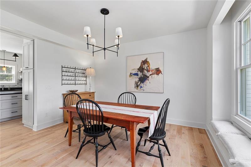 7600 Barnes Road Palmetto, GA 30268 - Photo 19 of 37 a view of a dining room with furniture window and wooden floor