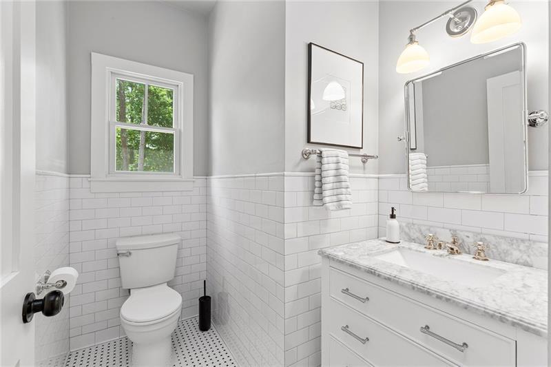 7600 Barnes Road Palmetto, GA 30268 - Photo 20 of 37 a bathroom with a granite countertop toilet a sink and a mirror