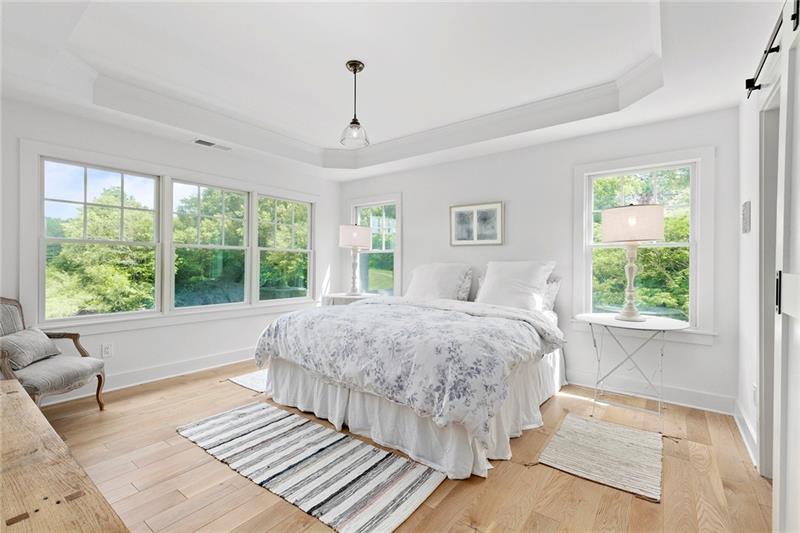 7600 Barnes Road Palmetto, GA 30268 - Photo 24 of 37 a spacious bedroom with a bed and a window