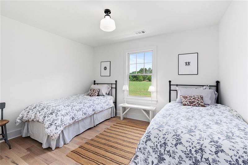 7600 Barnes Road Palmetto, GA 30268 - Photo 32 of 37 a bedroom with a bed and a window