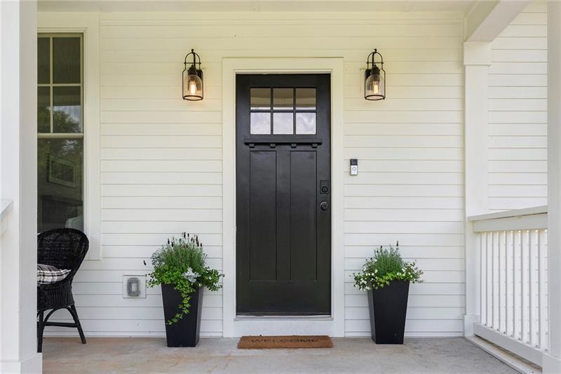 7600 Barnes Road Palmetto, GA 30268 - Photo 5 of 37 a potted plant sitting in front of a house