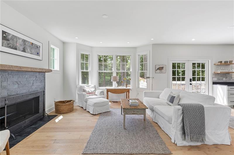 7600 Barnes Road Palmetto, GA 30268 - Photo 8 of 37 a living room with furniture and a fireplace