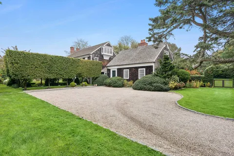 a house view with a garden space