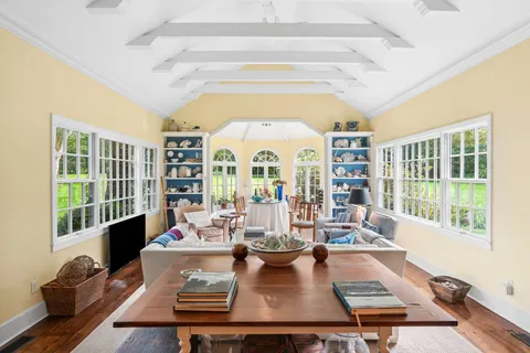 a view of a living room and dining room