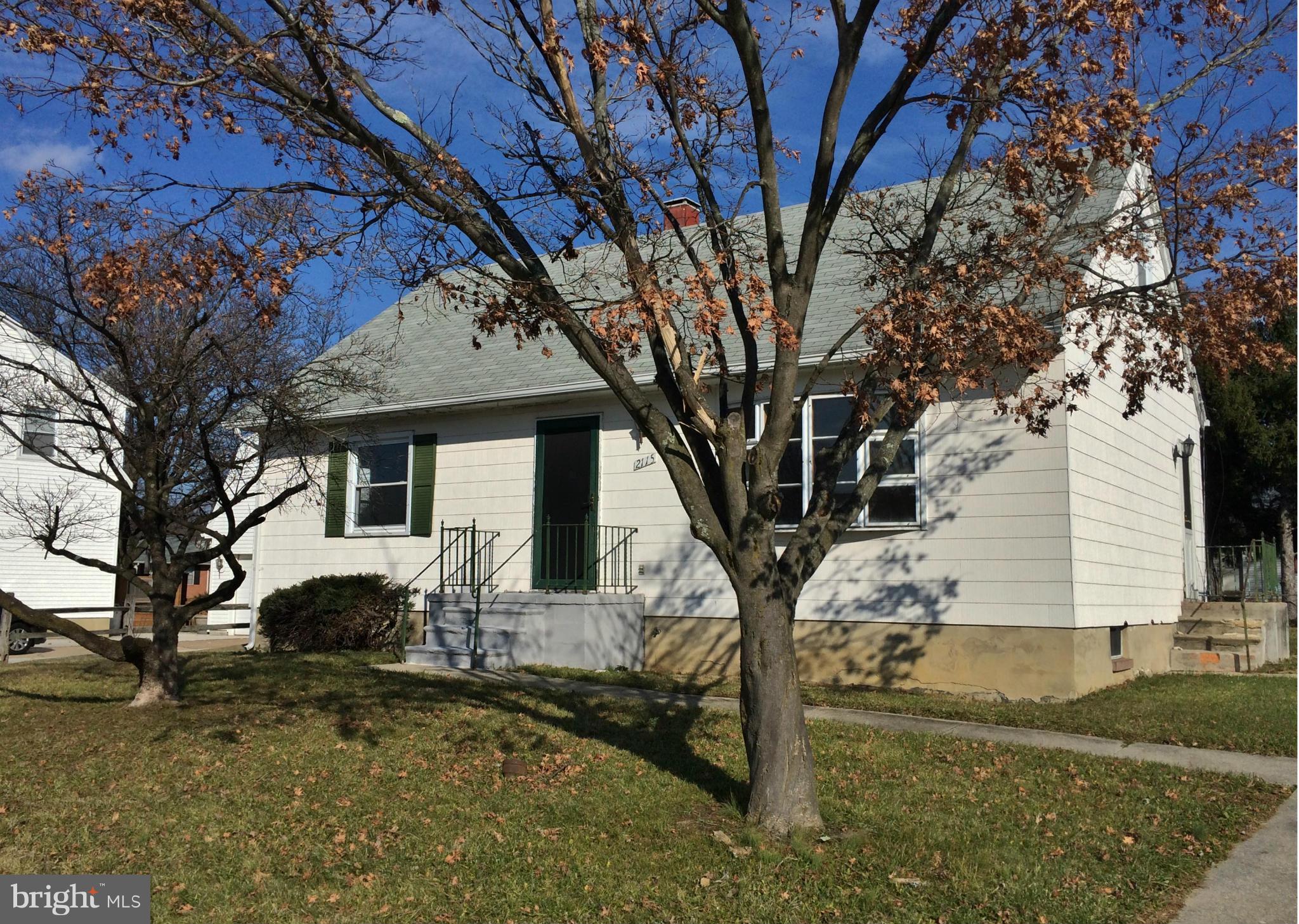 2115 Gaybrook Road Baltimore, MD 21244 - Photo 1 of 10 a front view of a house with garden