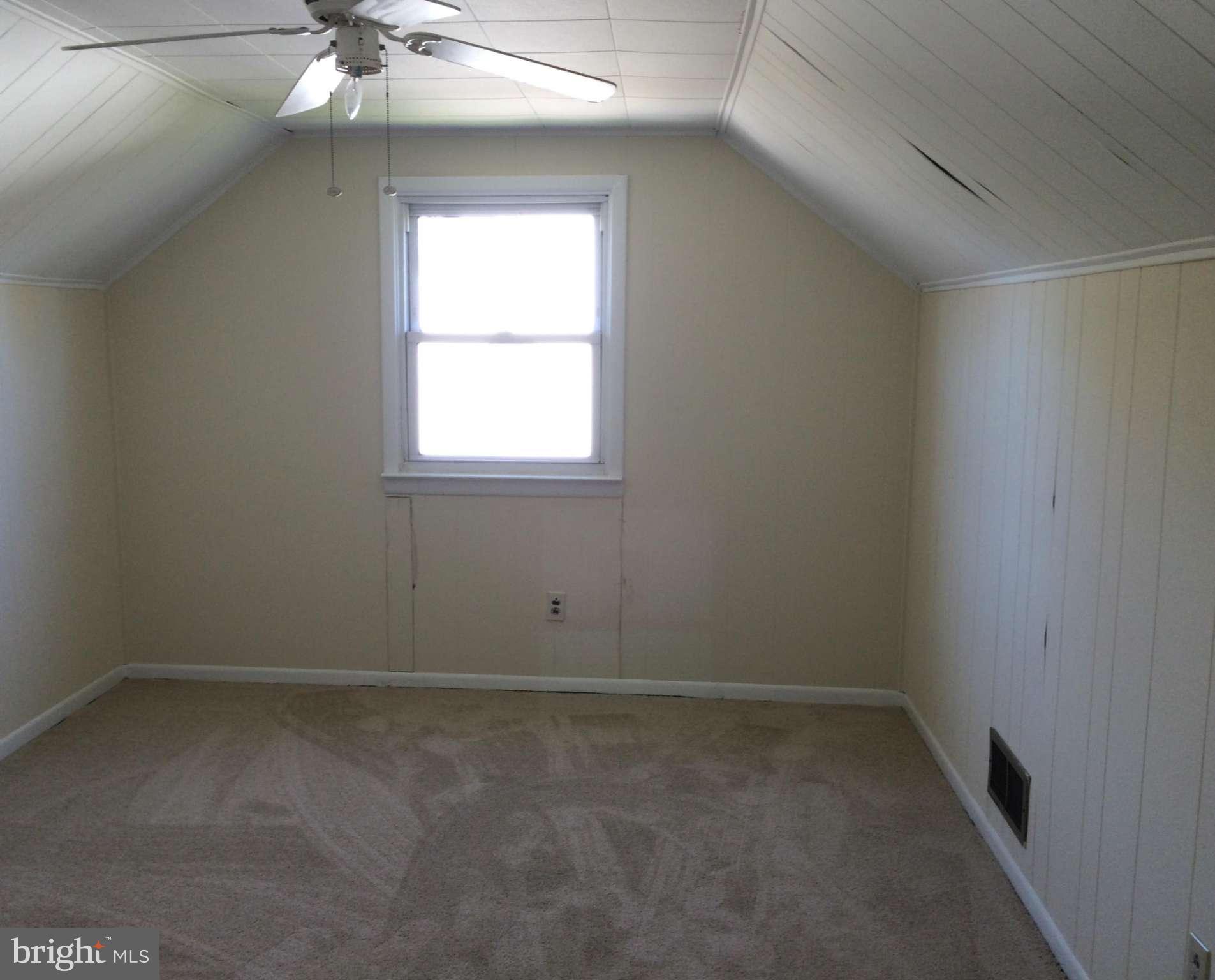 2115 Gaybrook Road Baltimore, MD 21244 - Photo 9 of 10 an empty room with a window