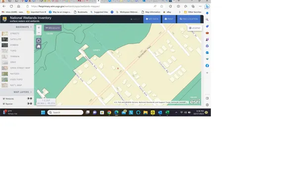 a picture of a bench in front of a window