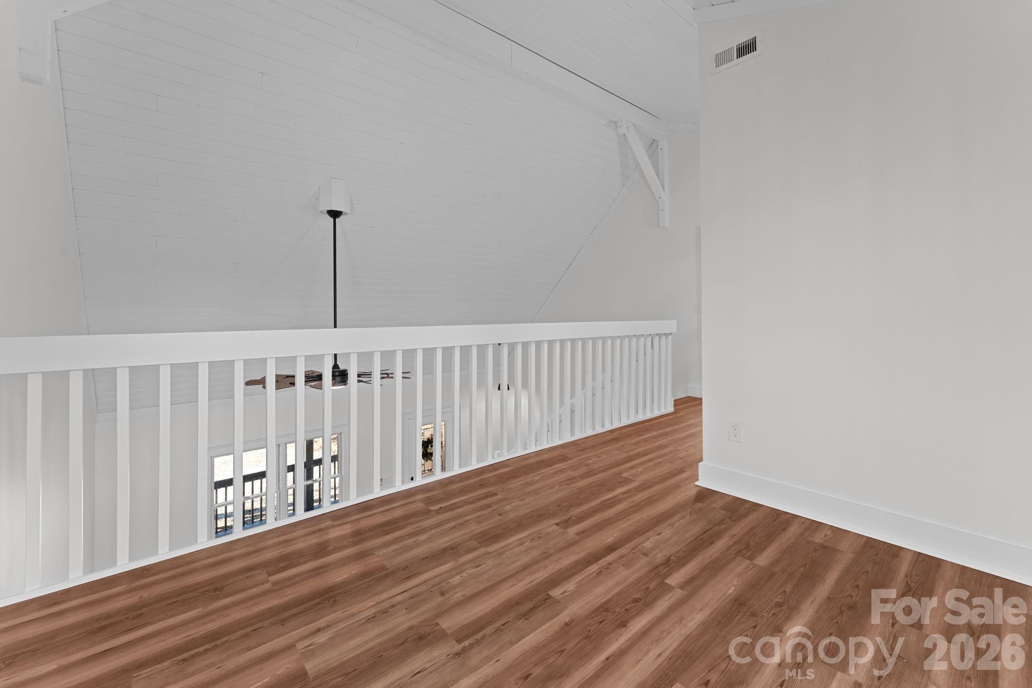 15 Glory Road Franklin, NC 28734 - Photo 19 of 37 a view of wooden floor with a window
