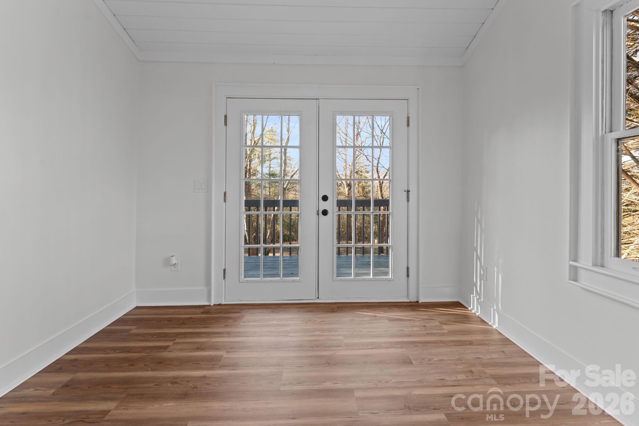15 Glory Road Franklin, NC 28734 - Photo 20 of 37 wooden floor and white walls