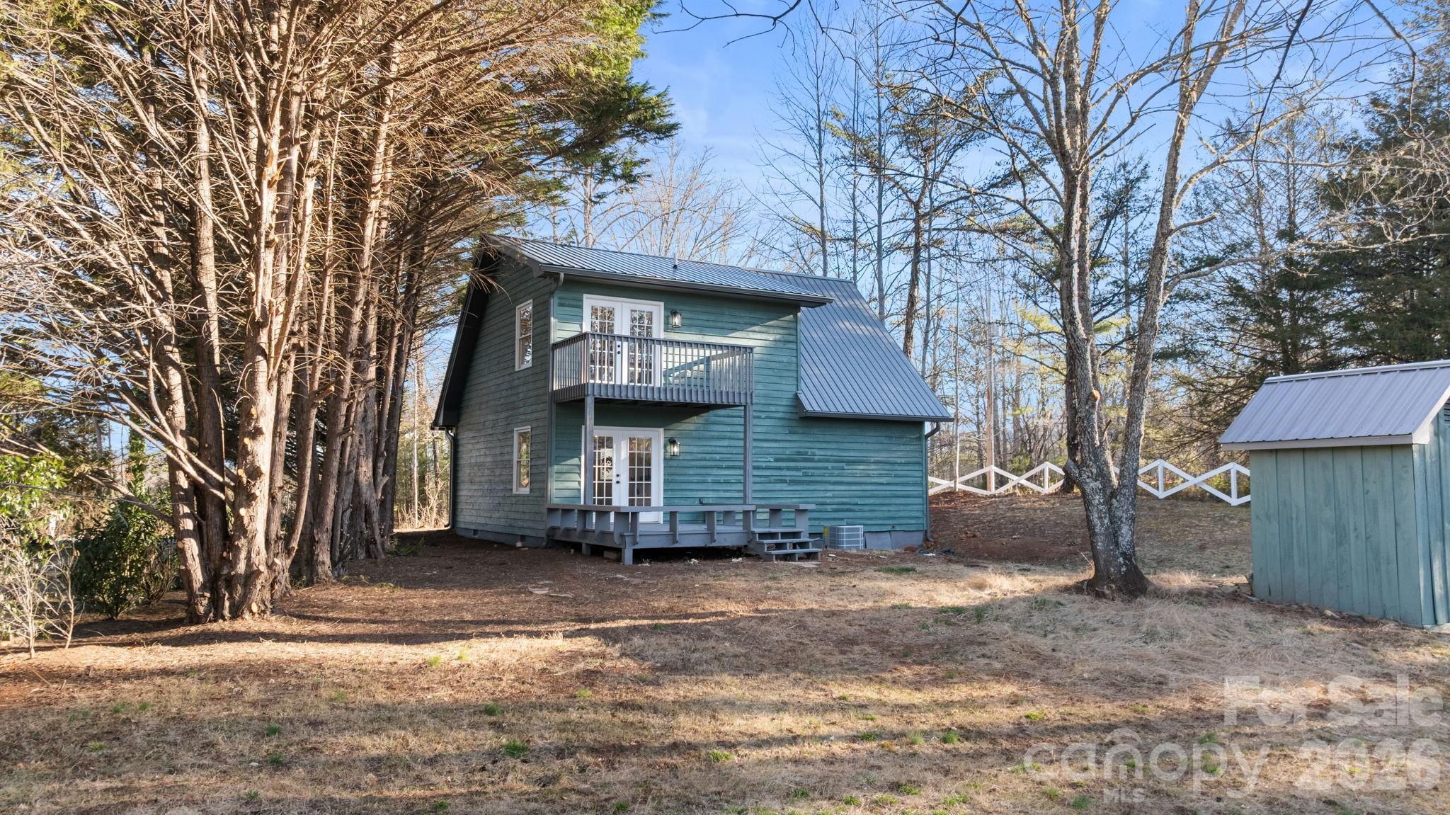 15 Glory Road Franklin, NC 28734 - Photo 2 of 37 a front view of a house with a yard