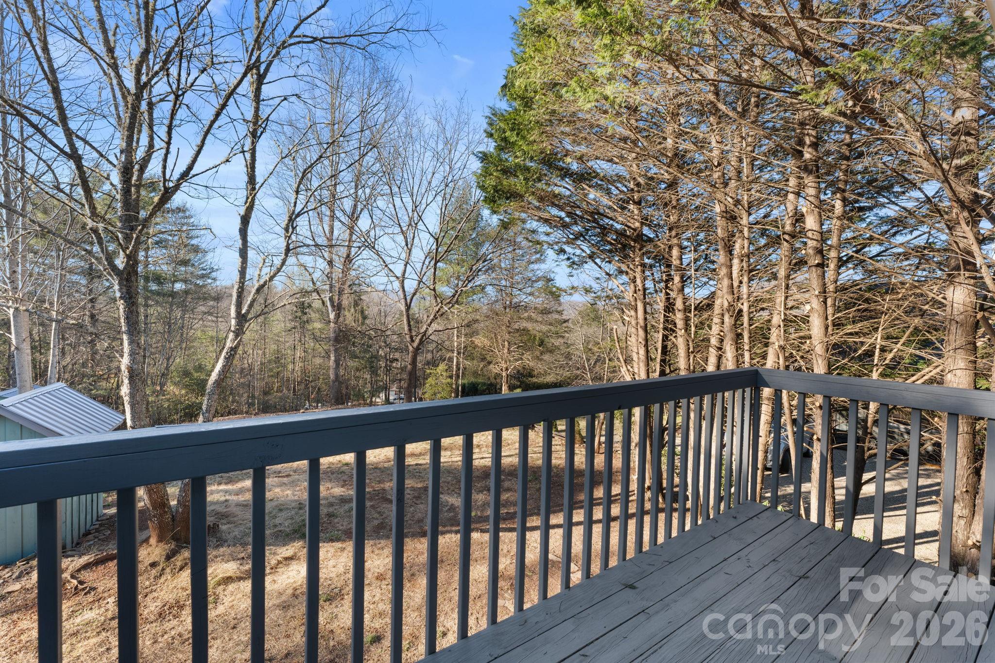 15 Glory Road Franklin, NC 28734 - Photo 27 of 37 a view of a balcony with wooden fence and floor