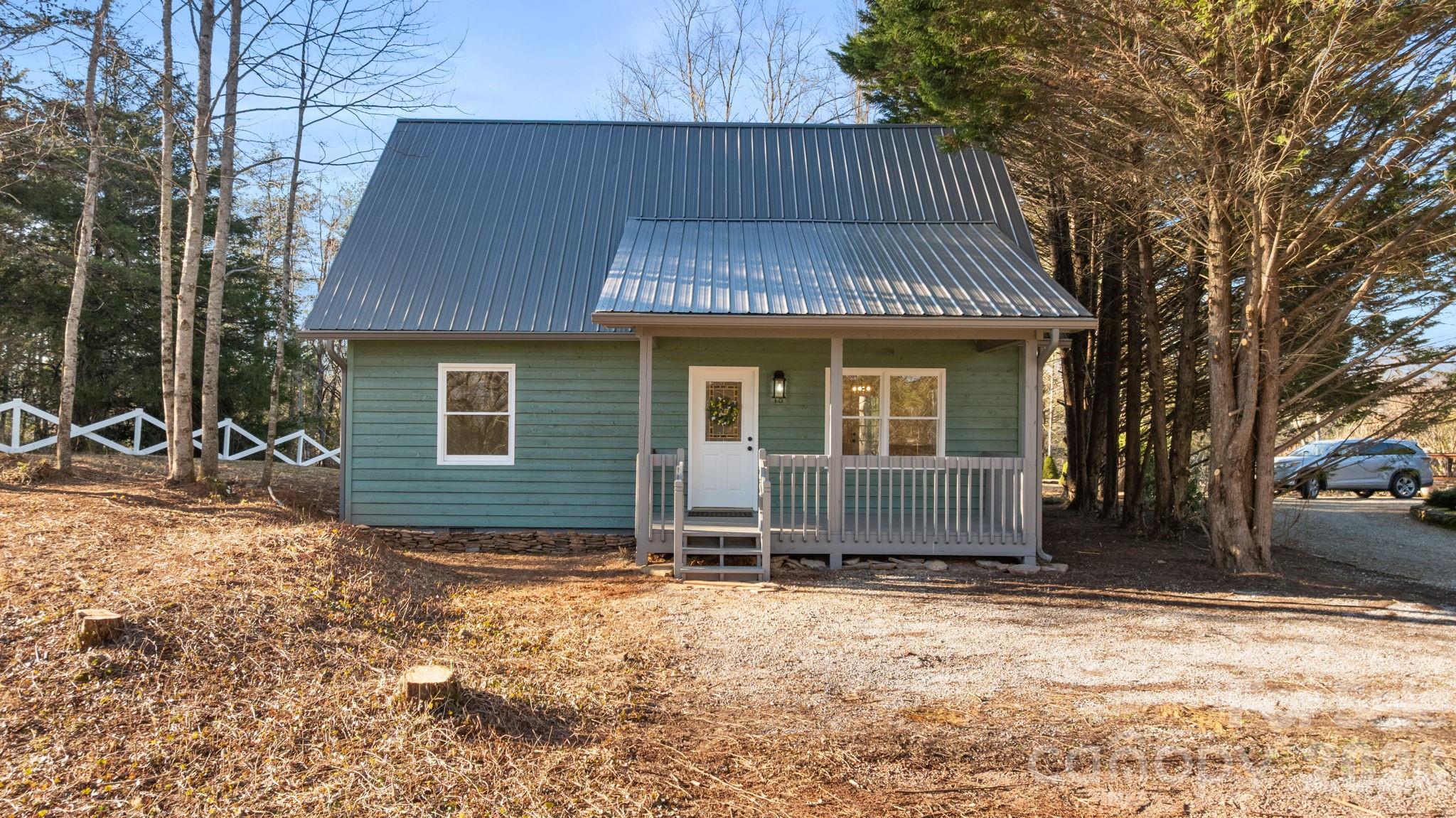 15 Glory Road Franklin, NC 28734 - Photo 29 of 37 a front view of a house with a yard