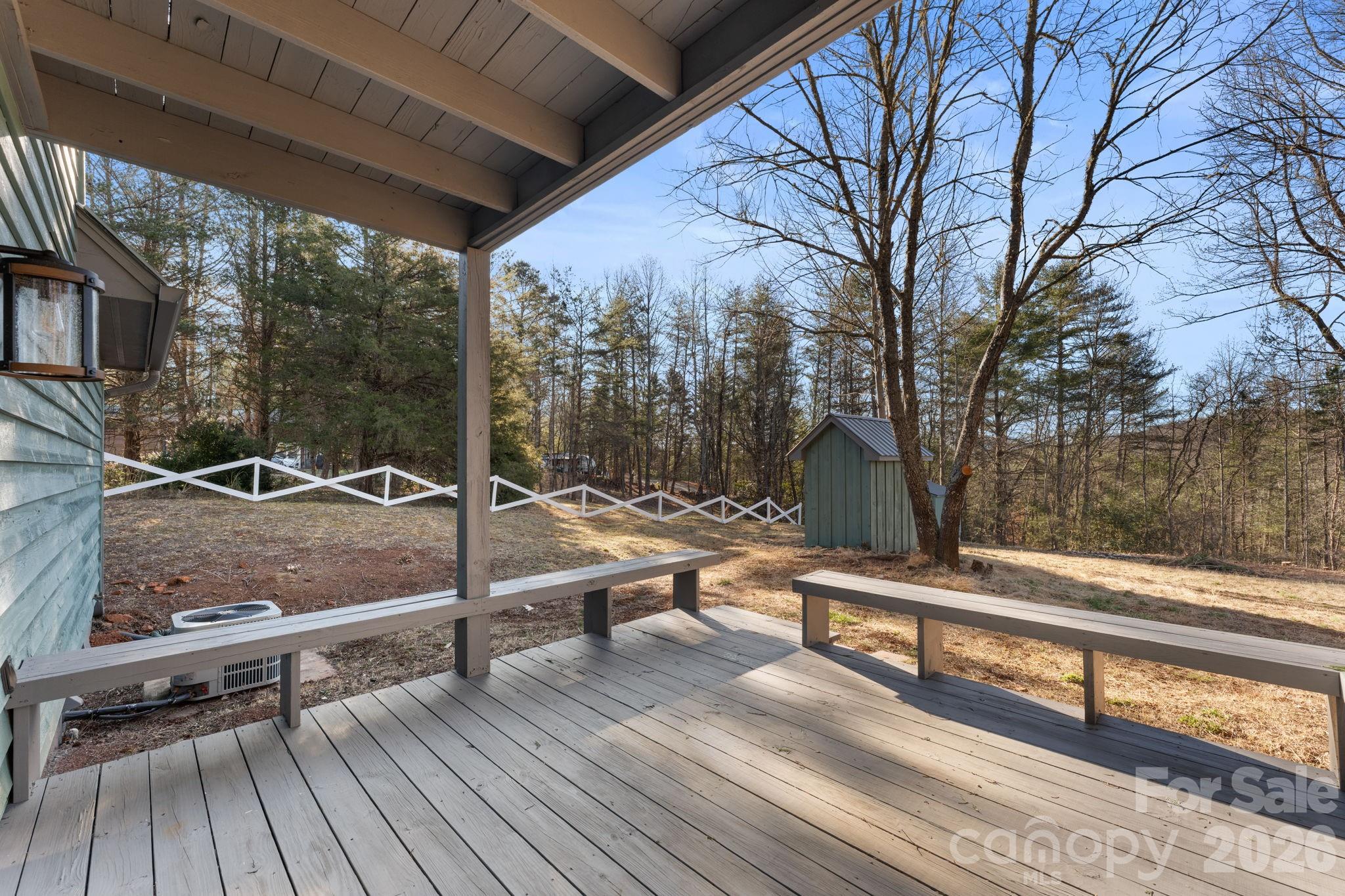 15 Glory Road Franklin, NC 28734 - Photo 32 of 37 a view of backyard with wooden floor and outdoor seating