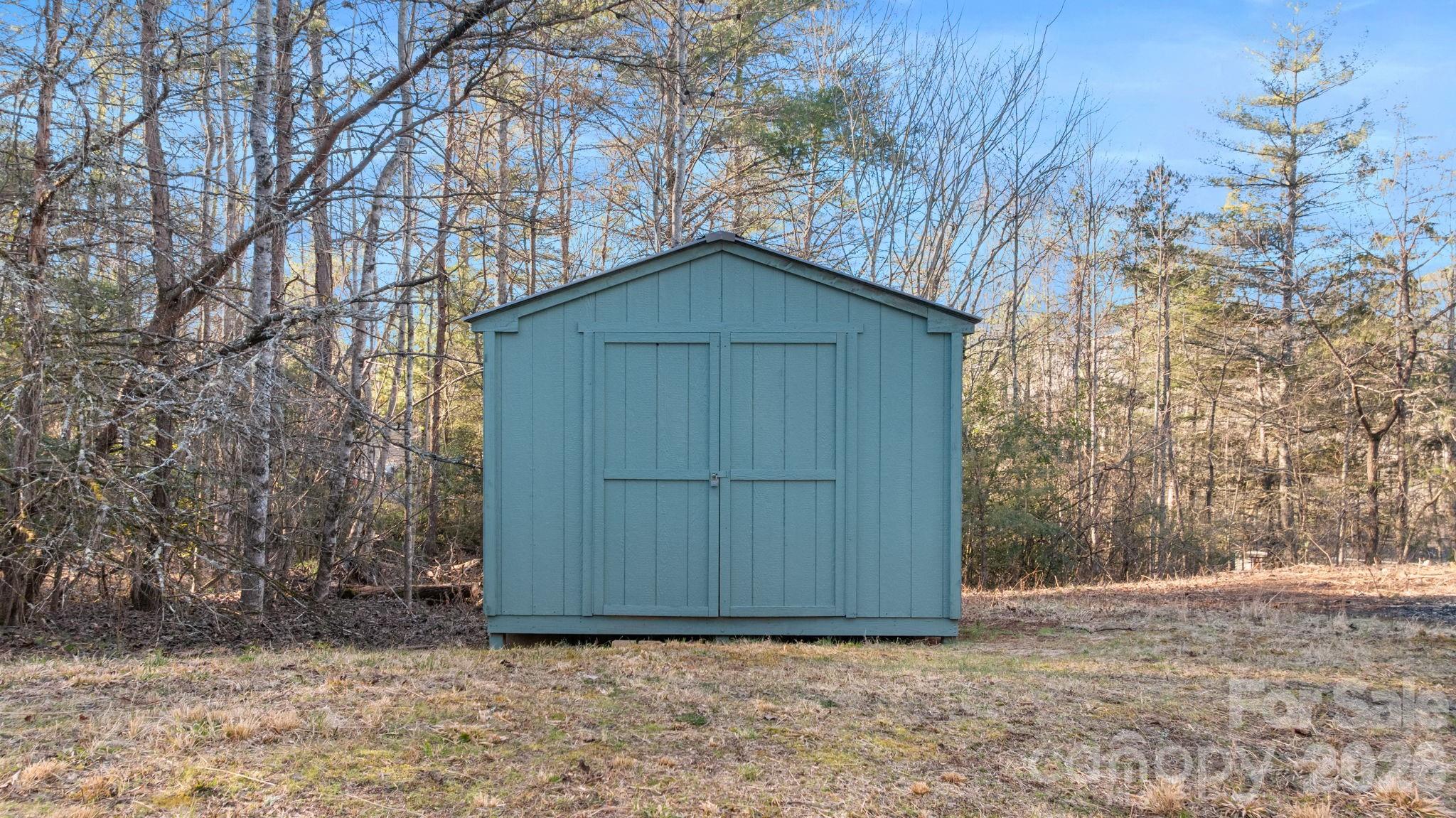 15 Glory Road Franklin, NC 28734 - Photo 34 of 37 a wooden door in front of a house